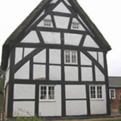 This Grade II timber framed Listed Building had been re-rendered in the 1980's with a cement render!! This had cracked when the structure seasonally moved, these cracks then let water into the structure and into the property.