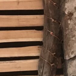 A close up of the copper ties holding the laths in position.