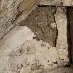 The original plaster was based on two coats of a clay based render, most probably just clay and straw and a lime plaster top coat.