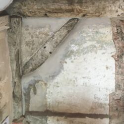All loose edges of existing plaster were consolidated in two coats against the timber frame.