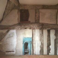 The finished wall prior to limewashing and the decoration of the fire surround.