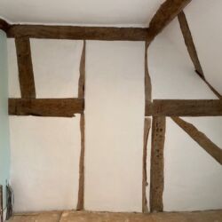 The finished wall after six coats of limewash.