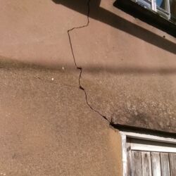 The cement render was cracking and was detaching itself from the cob.