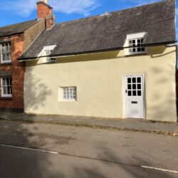 Once the render had dried the wall was decorated with a breathable approved paint. (Keim). Limewash was not used due to the poor design of the front windows that allowed rain to pour down the front of the wall, limewash would be constantly washed away in these areas.