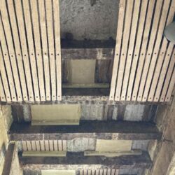 This photo shows the various stages of support and repair. The lath frame supports screwed to the insides of the joists; the laths then plastered over to consolidate that support. Lastly the new oak ceiling laths fixed to the floor joists. This ceiling was then plastered with lime plaster.