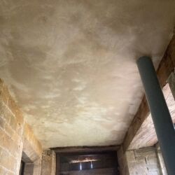 The completed repair. The repairs to the floor above are concealed by the new lath and plaster ceiling.