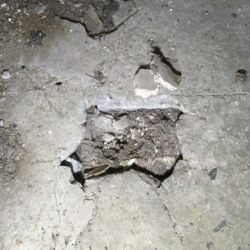 Cracks emanated from some of the larger voids.