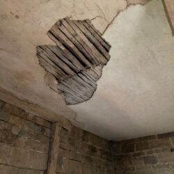 The laths on part of the ceiling were rotten and were replaced.