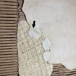 A matching top coat plaster was trialled in the workshop and in-situ, the arrow points to the sample approved by the Conservation officer. Note the plaster was matching the original colour of the plaster, not the existing ceiling colour which was dirt and soot affected.