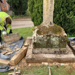 The original stones were taken up. Two of the original stones were in relatively good condition and were reused.
